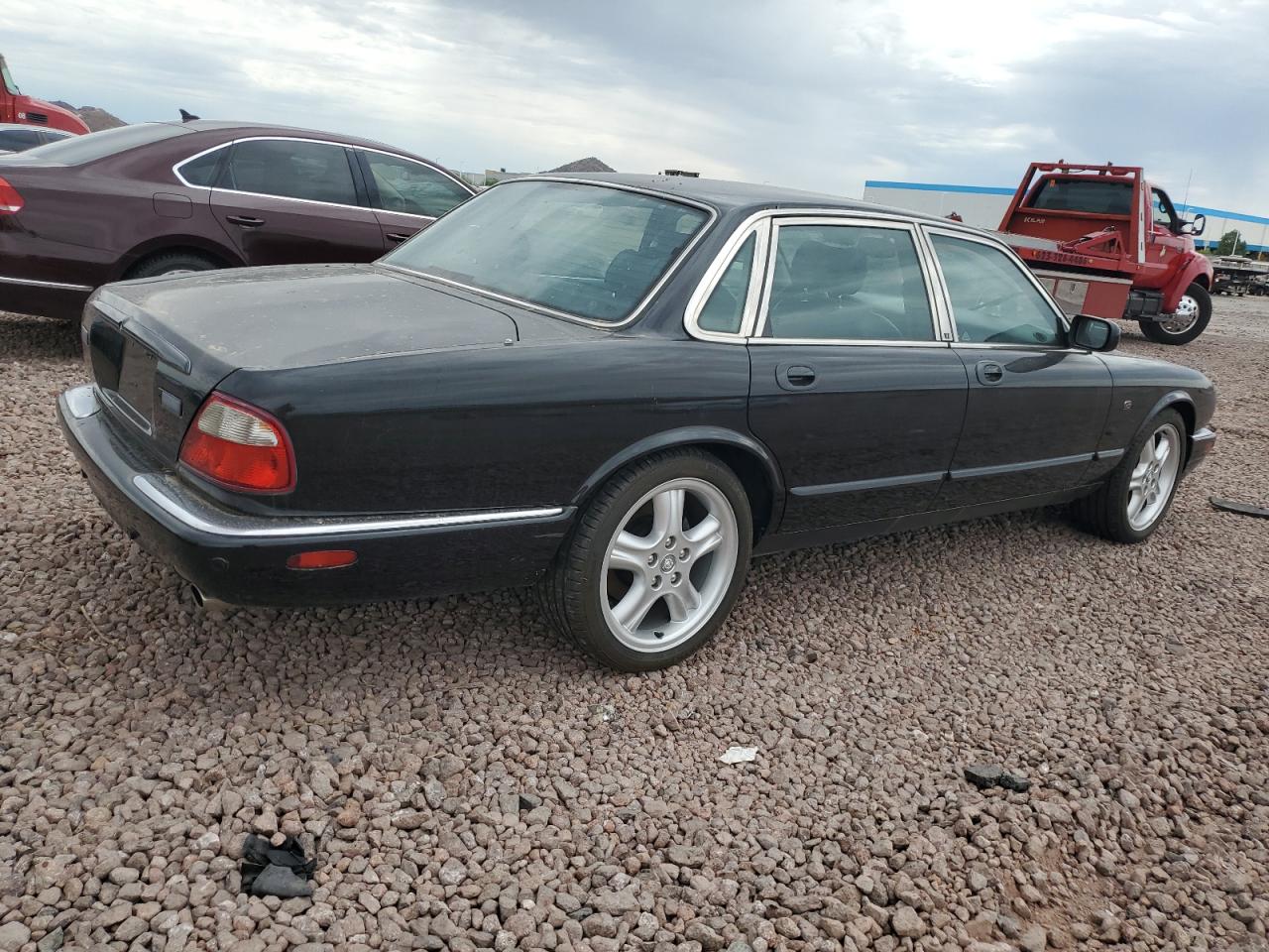 2002 Jaguar XJ VIN SAJDA12C82LF42173 Copart auction photo, minor dent/scratches damage thumbnail 3