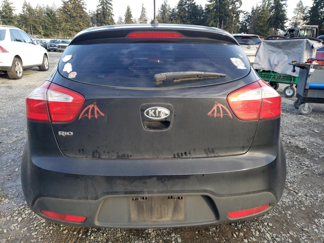 2012 KIA Rio VIN KNADM5A34C6023937 Copart auction photo, side damage thumbnail 6