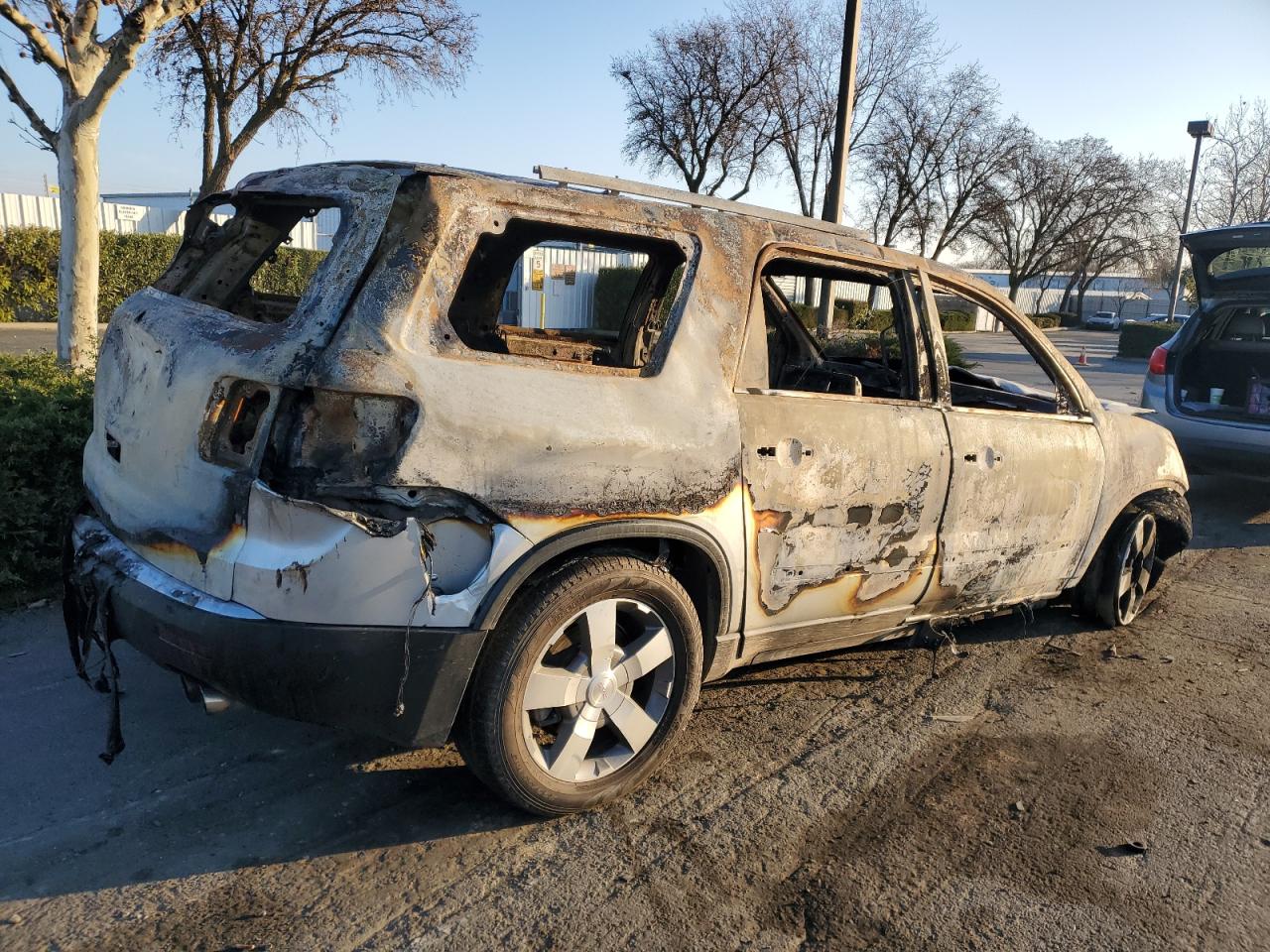 2012 GMC Acadia VIN 1GKKRREDXCJ298123 Copart auction photo, burn damage thumbnail 3