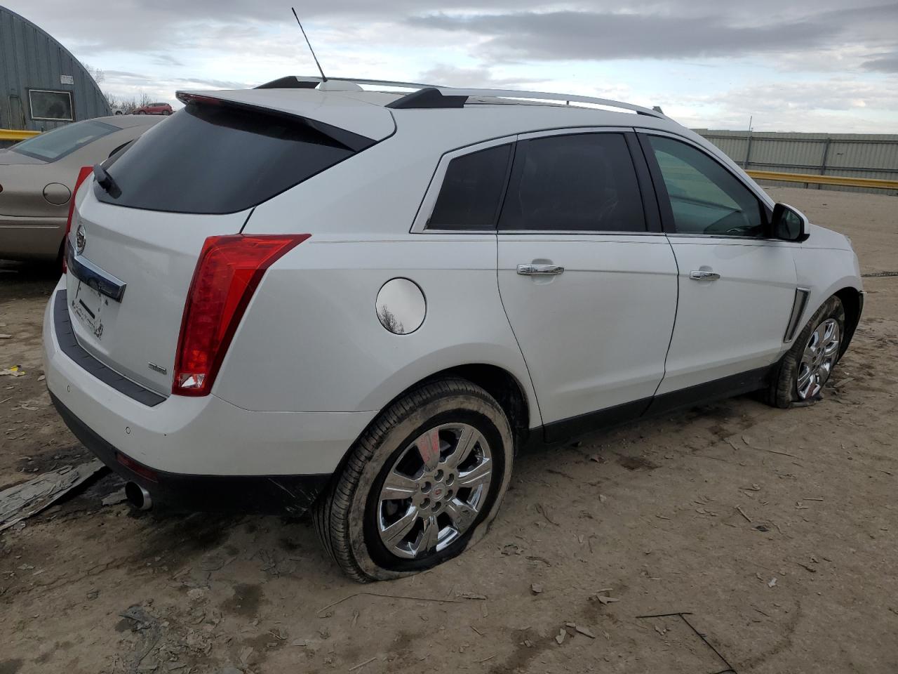 2015 Cadillac SRX VIN 3GYFNBE36FS599993 Copart auction photo, front end damage thumbnail 3