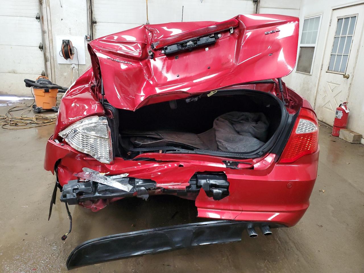 2012 Ford Fusion VIN 3FAHP0JA7CR434495 Copart auction photo, rear end / minor dent/scratches damage thumbnail 6