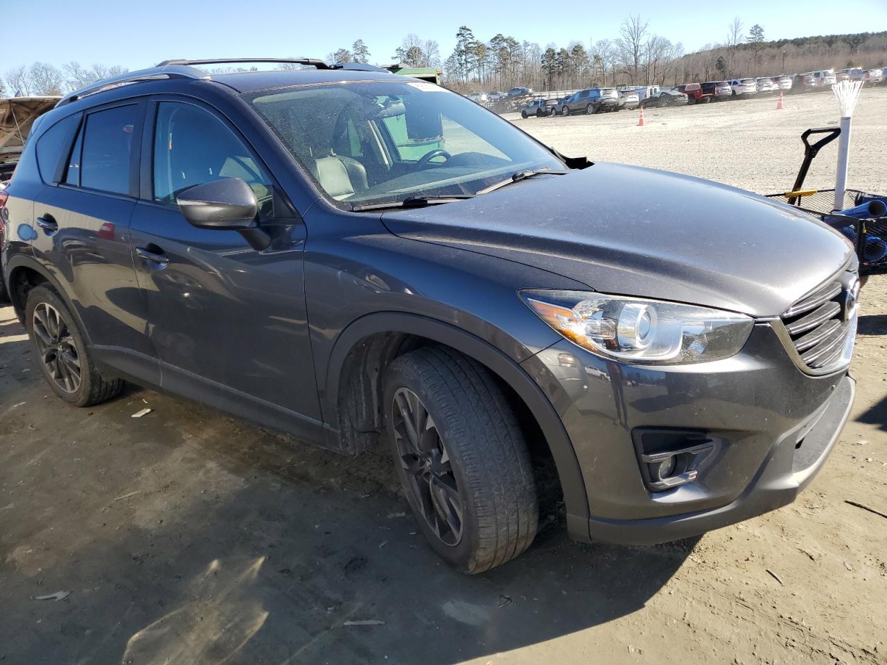 2016 Mazda CX-5 VIN JM3KE4DYXG0743042 Copart auction photo, front end damage thumbnail 4