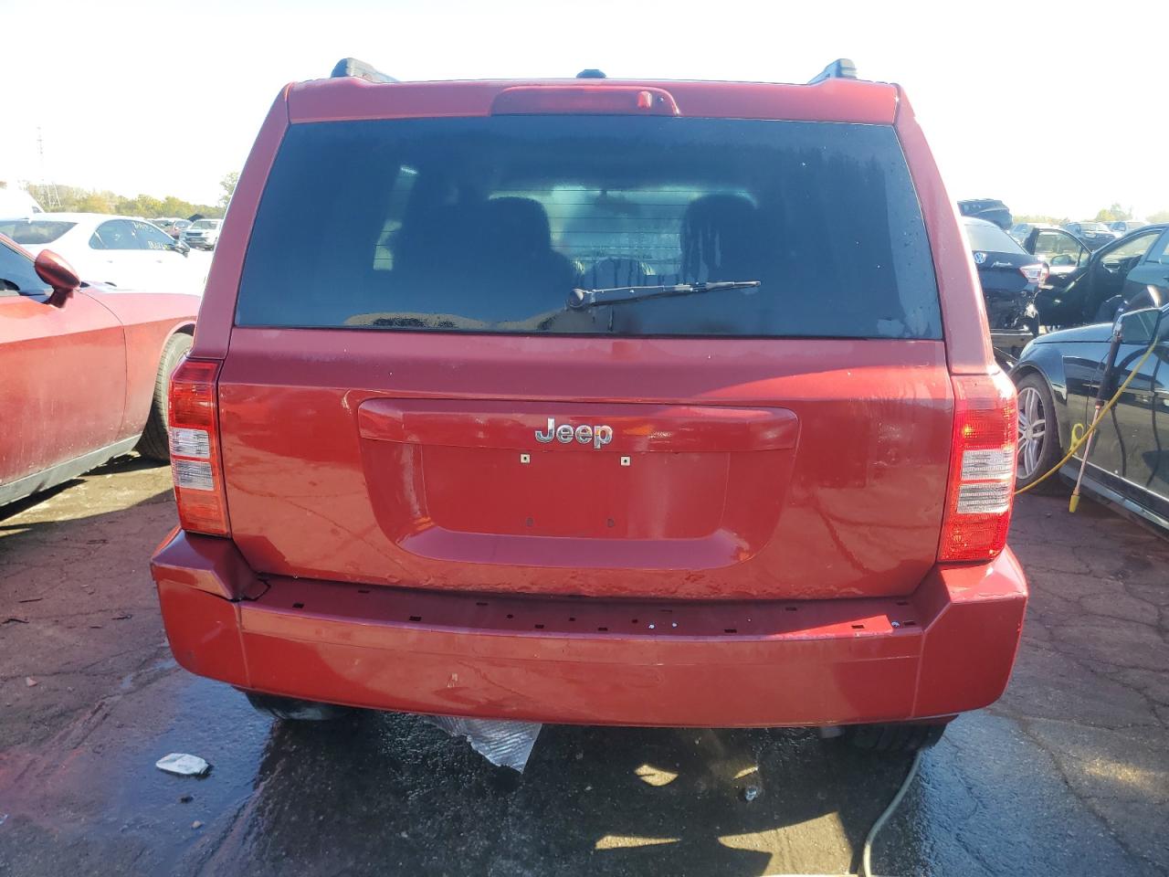 2010 Jeep Liberty (Patriot) VIN 1J4NT1GA6AD634970 Copart auction photo, minor dent/scratches damage thumbnail 6