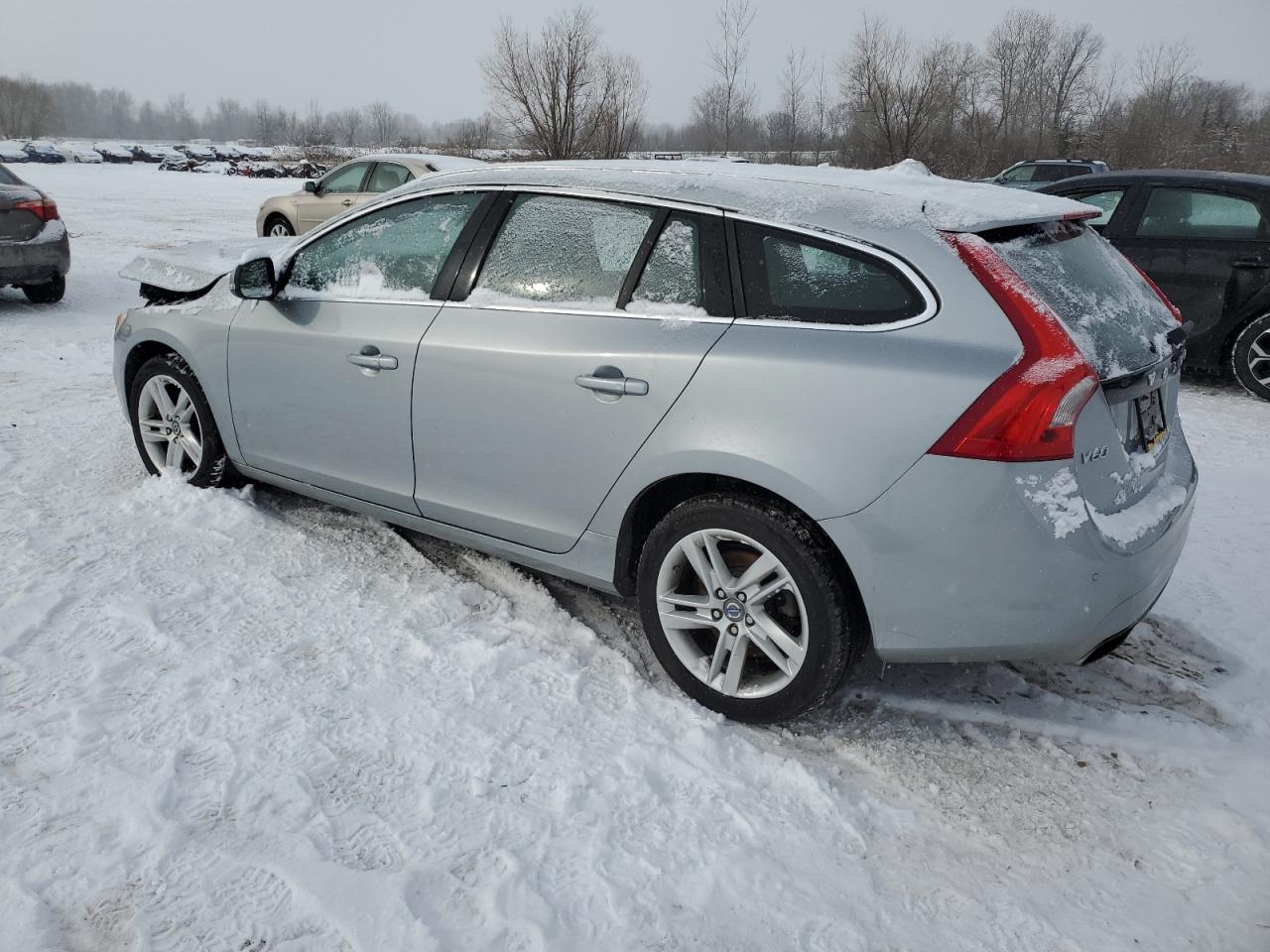 2015 Volvo V60 VIN YV140MEM1F1227750 Copart auction photo, side / front end damage thumbnail 2
