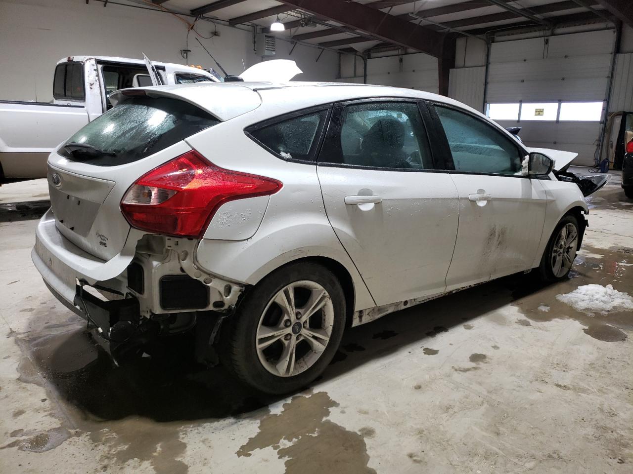 2014 Ford Focus VIN 1FADP3K2XEL232257 Copart auction photo, front end / rear end damage thumbnail 3