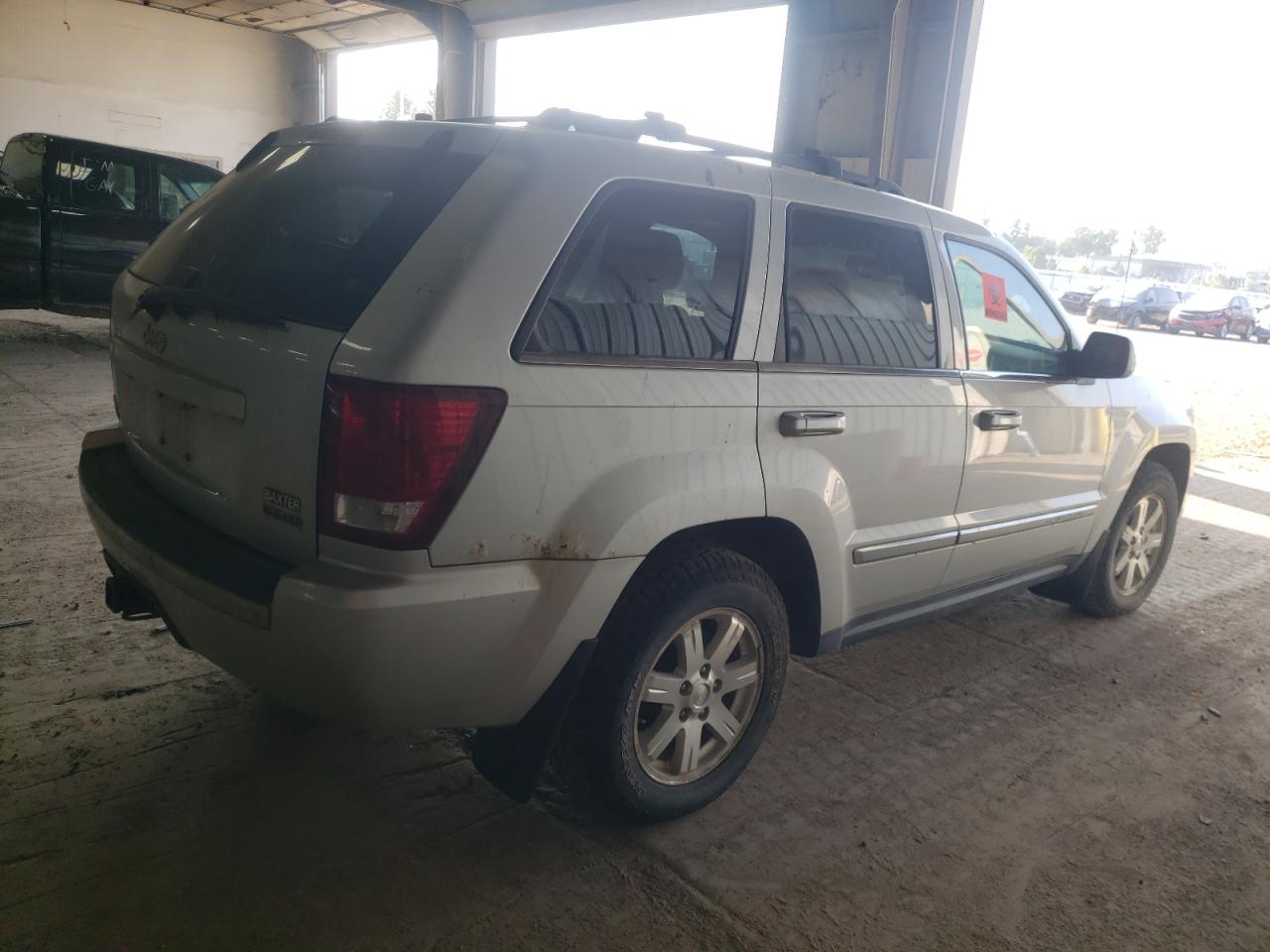 2009 Jeep Grand Cherokee VIN 1J8HR58T79C517191 Copart auction photo, hail damage thumbnail 3