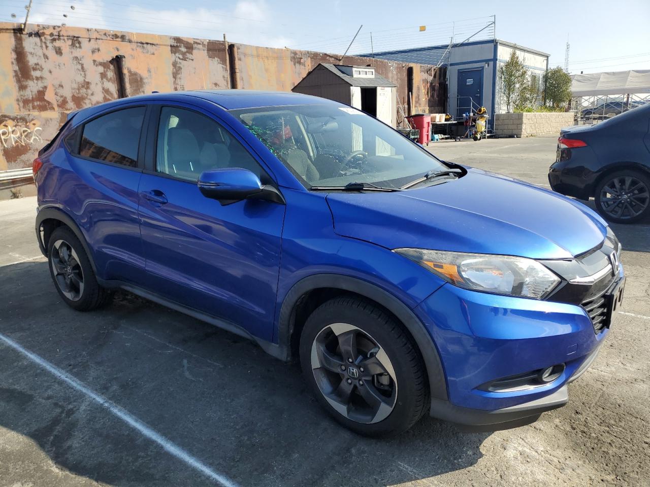 2018 Honda HR-V VIN 3CZRU5H55JM700422 Copart auction photo, rear end damage thumbnail 4