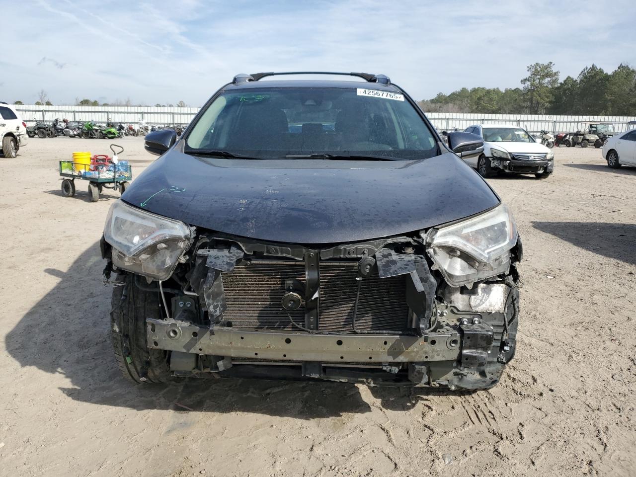 2017 Toyota RAV 4 VIN 2T3DFREVXHW571365 Copart auction photo, front end damage thumbnail 5