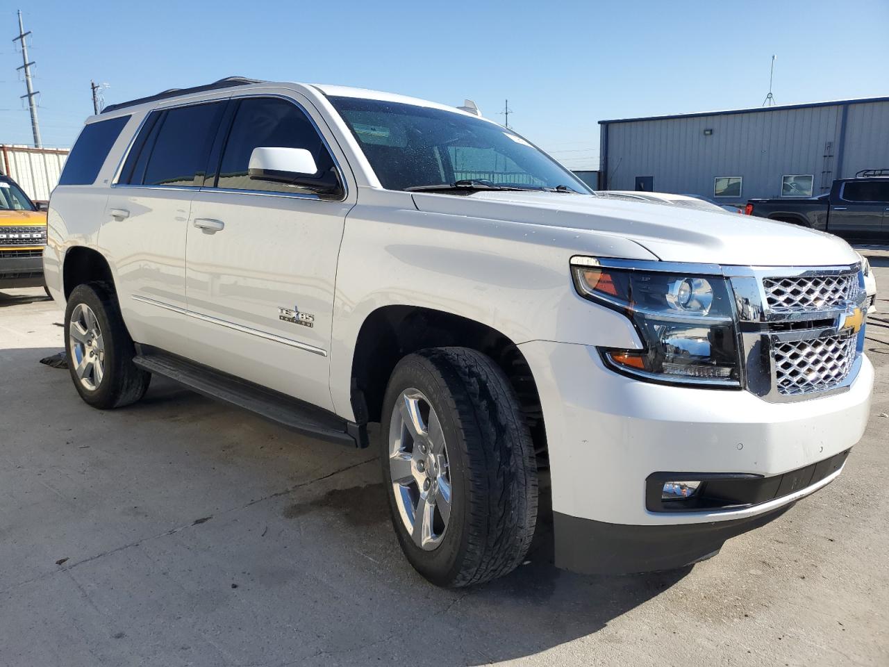 2020 Chevrolet Tahoe VIN 1GNSCBKCXLR240621 Copart auction photo, side / minor dent/scratches damage thumbnail 4