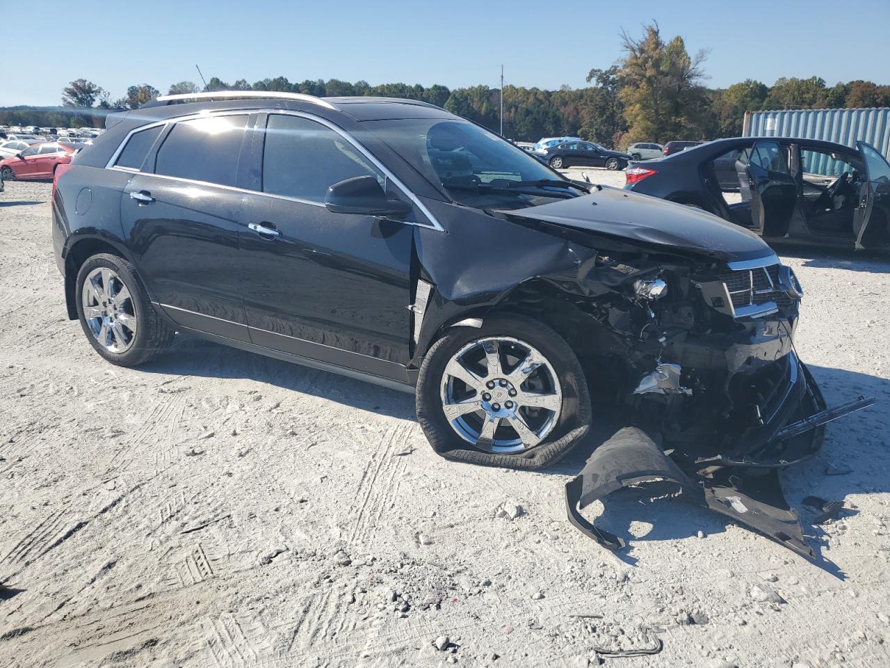 2012 Cadillac SRX VIN 3GYFNBE37CS612309 Copart auction photo, all over damage thumbnail 4
