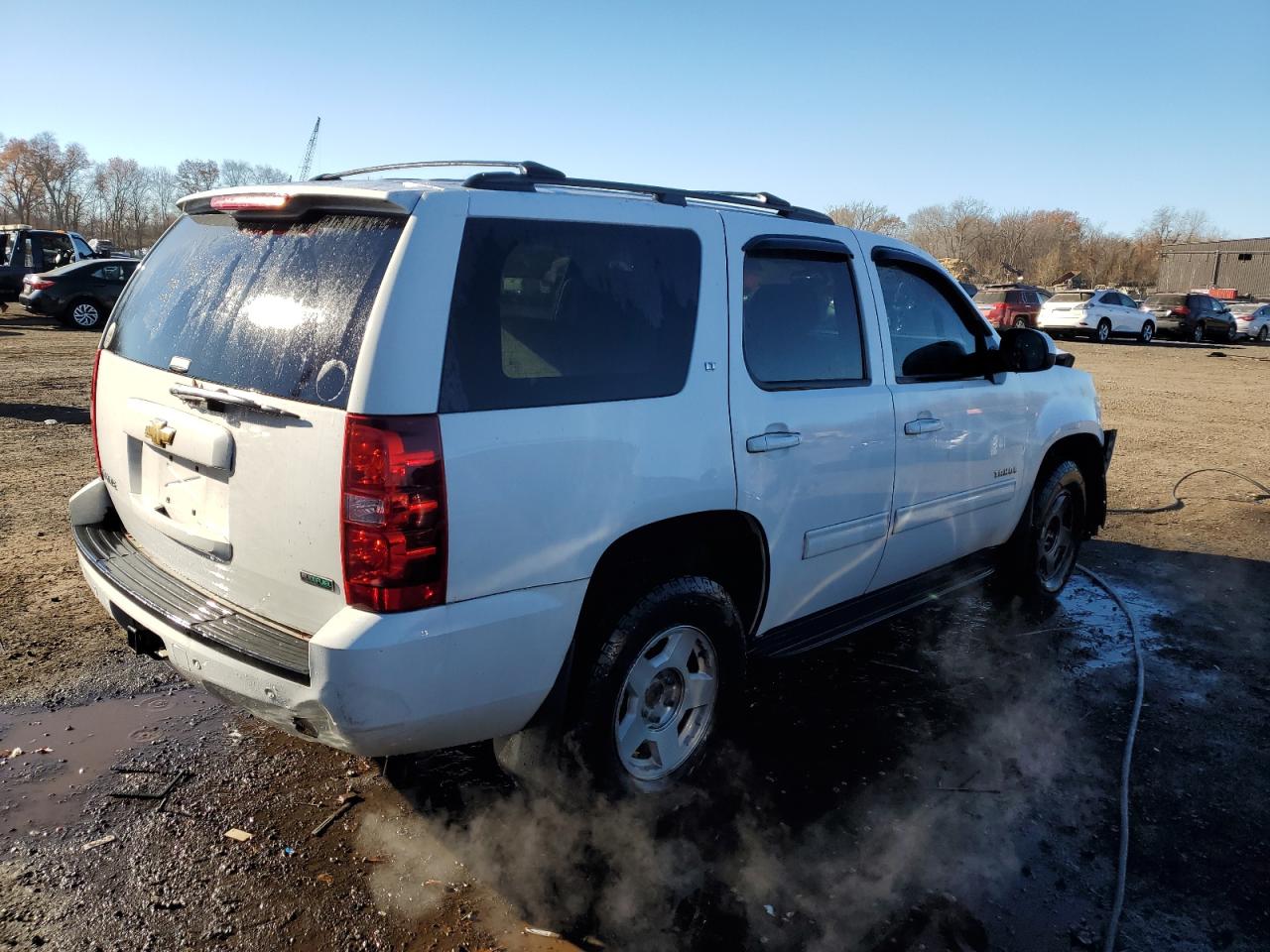 2011 Chevrolet Tahoe VIN 1GNSKBE01BR324622 Copart auction photo, front end / minor dent/scratches damage thumbnail 3