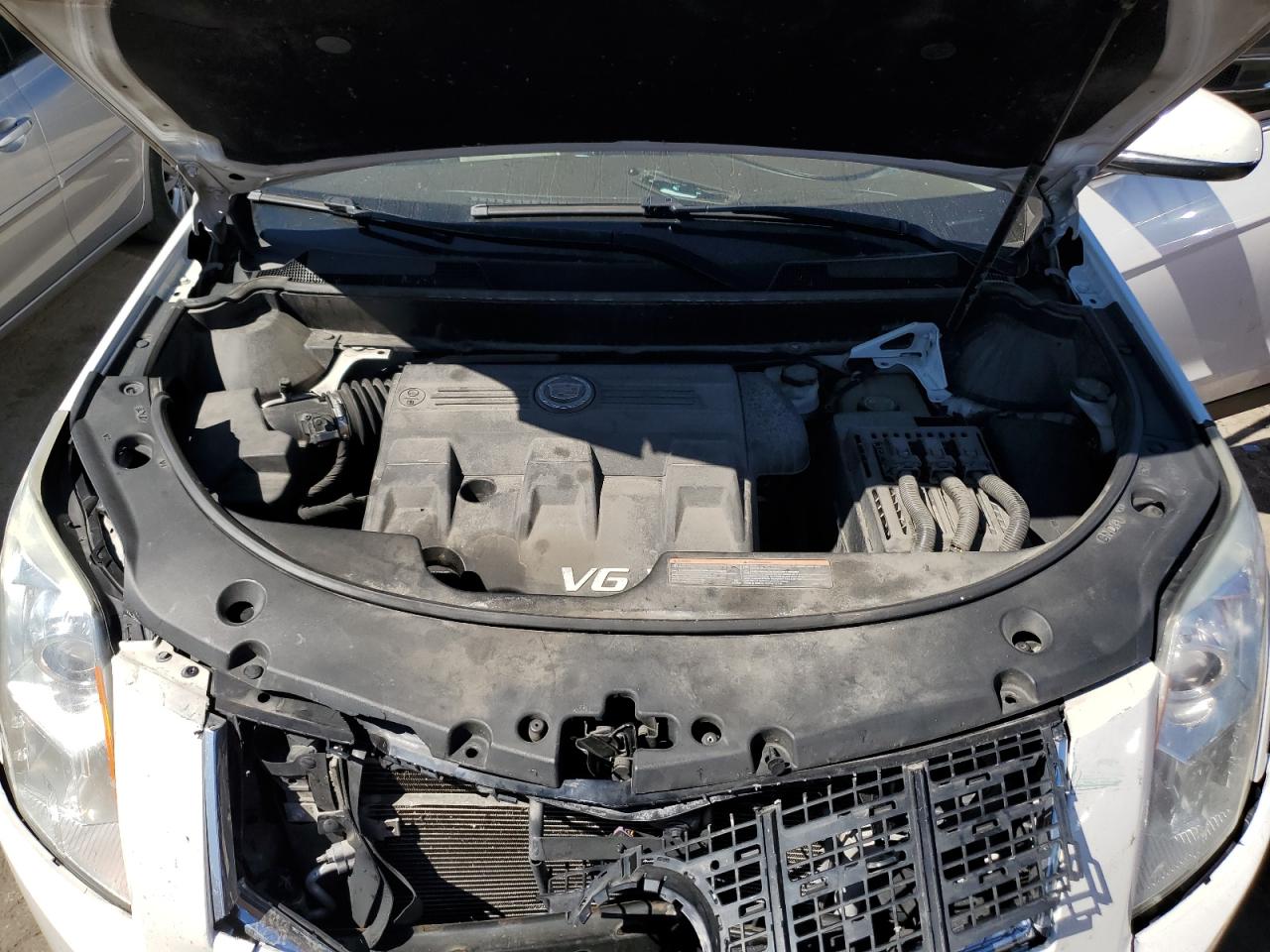 2015 Cadillac SRX VIN 3GYFNBE38FS512577 Copart auction photo, front end damage thumbnail 12