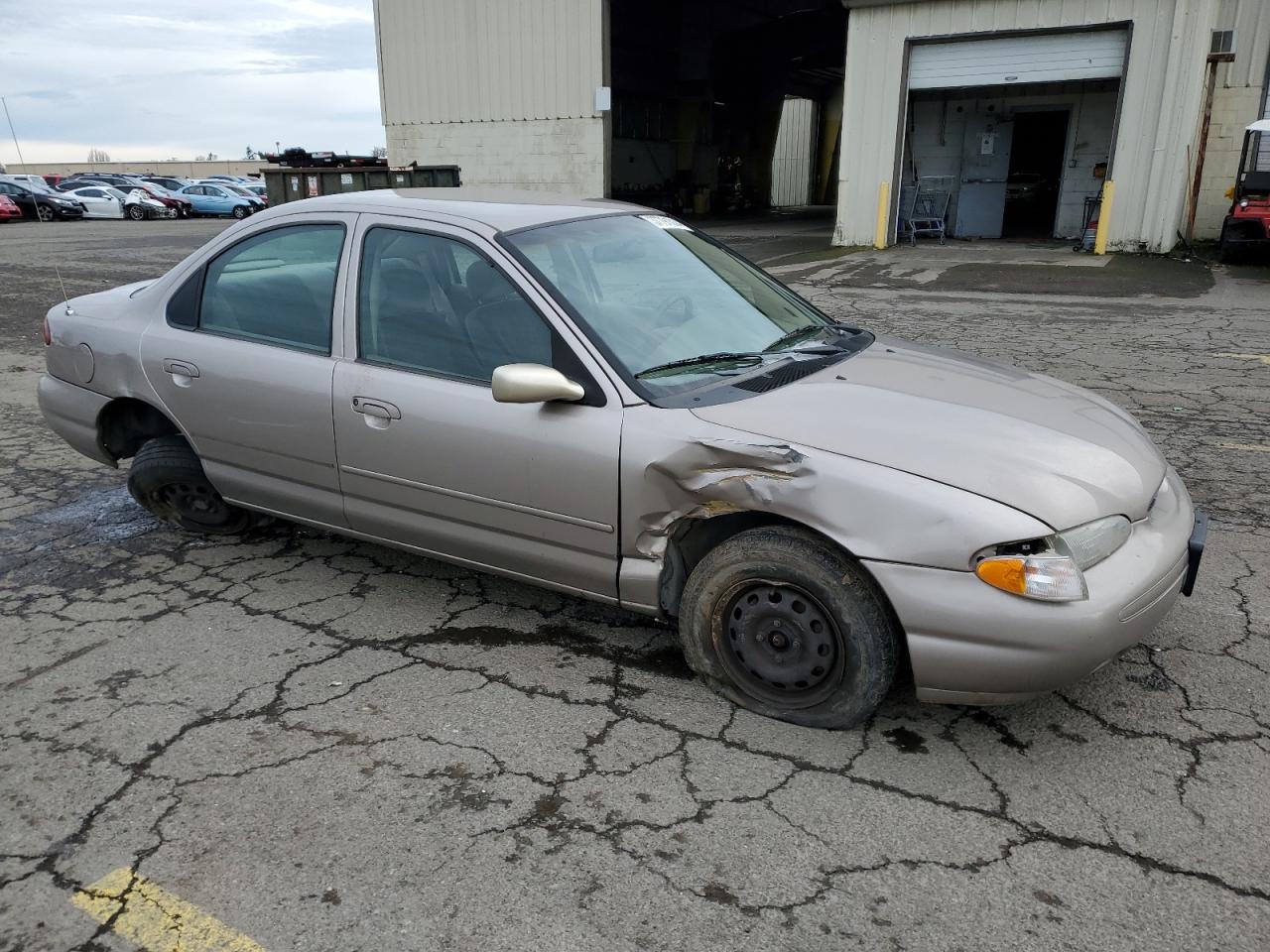 1996 Ford Contour VIN 3FALP6535TM129390 Copart auction photo, all over damage thumbnail 4