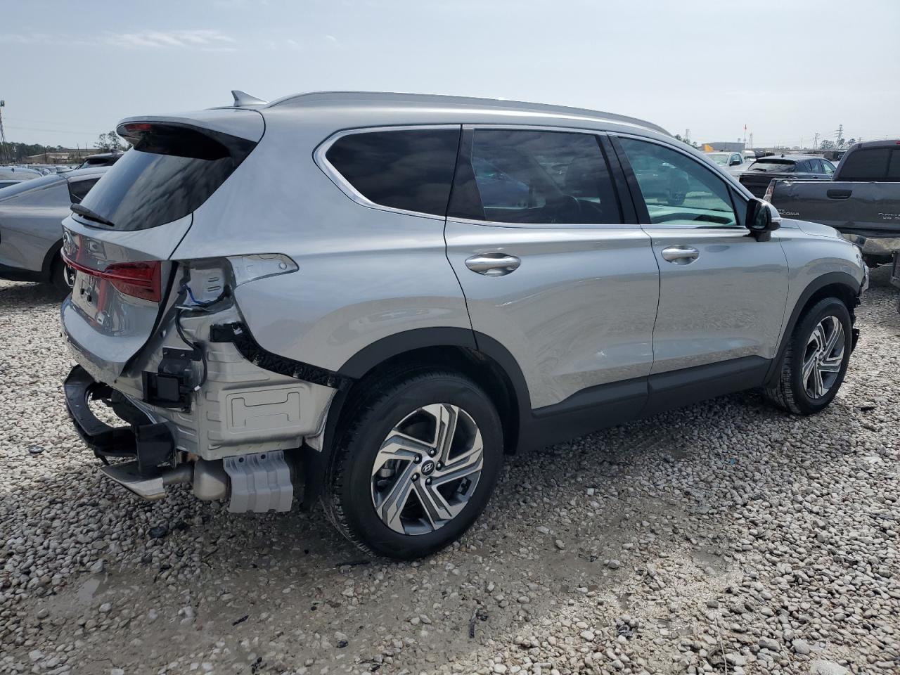 2023 Hyundai Santa Fe VIN 5NMS24AJ6PH601358 Copart auction photo, side / all over damage thumbnail 3