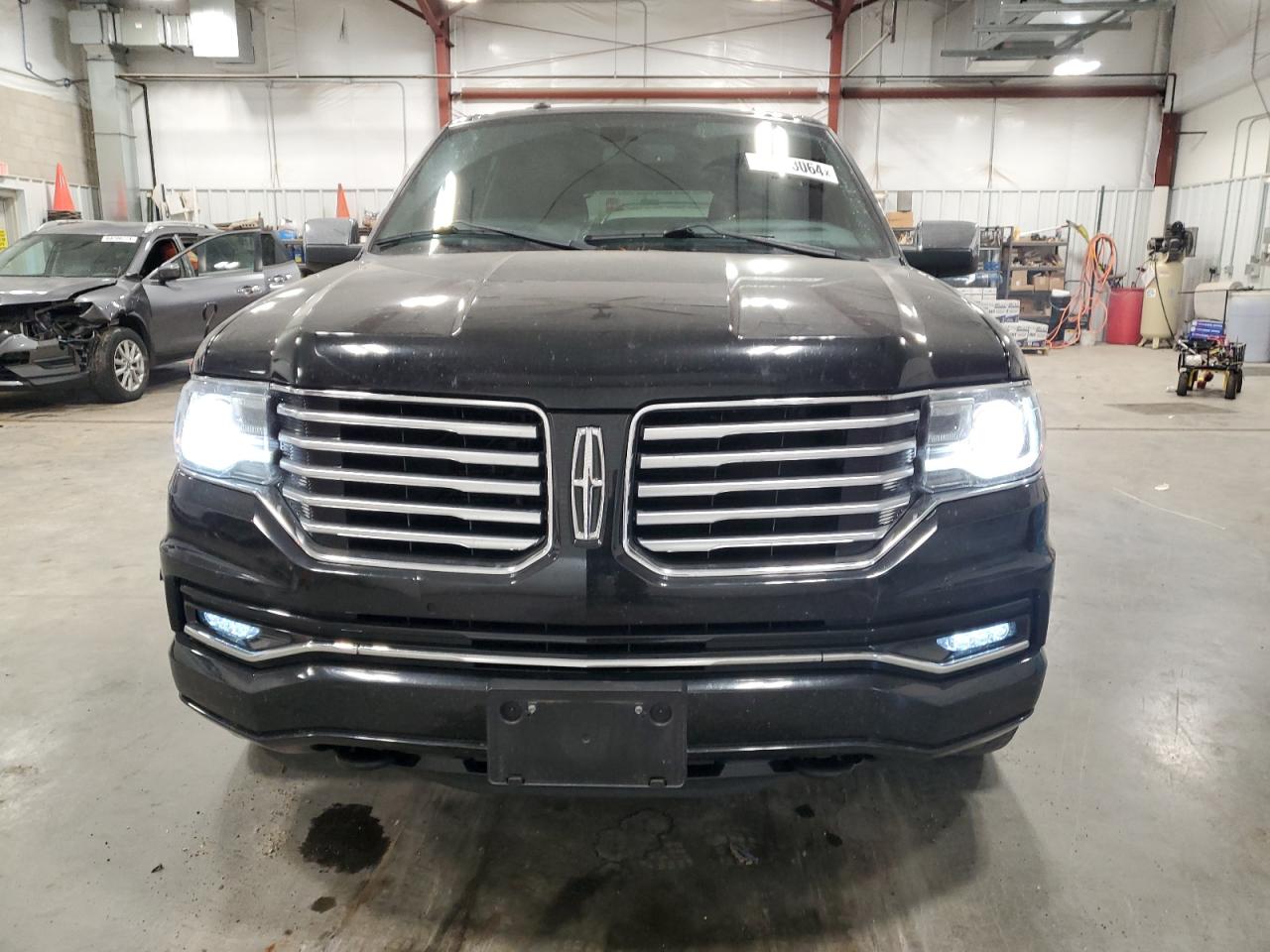 2017 Lincoln Navigator VIN 5LMJJ3LT6HEL00108 Copart auction photo, front end / side damage thumbnail 5