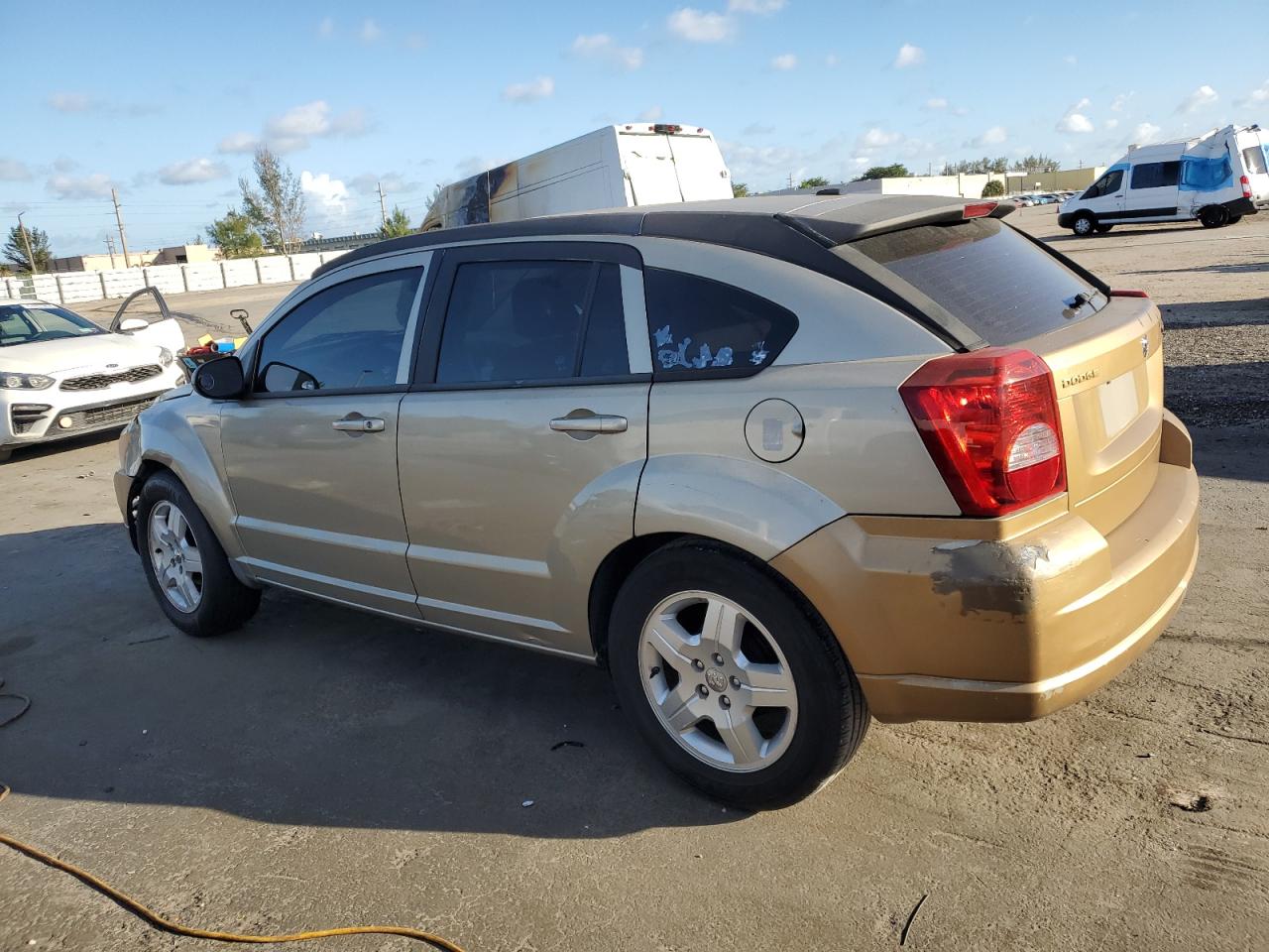 2009 Dodge Caliber VIN 1B3HB48A69D170775 Copart auction photo, front end / side damage thumbnail 2