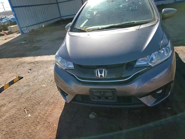 2015 Honda Fit VIN 3HGGK5G85FM770011 Copart auction photo, rear end damage thumbnail 11