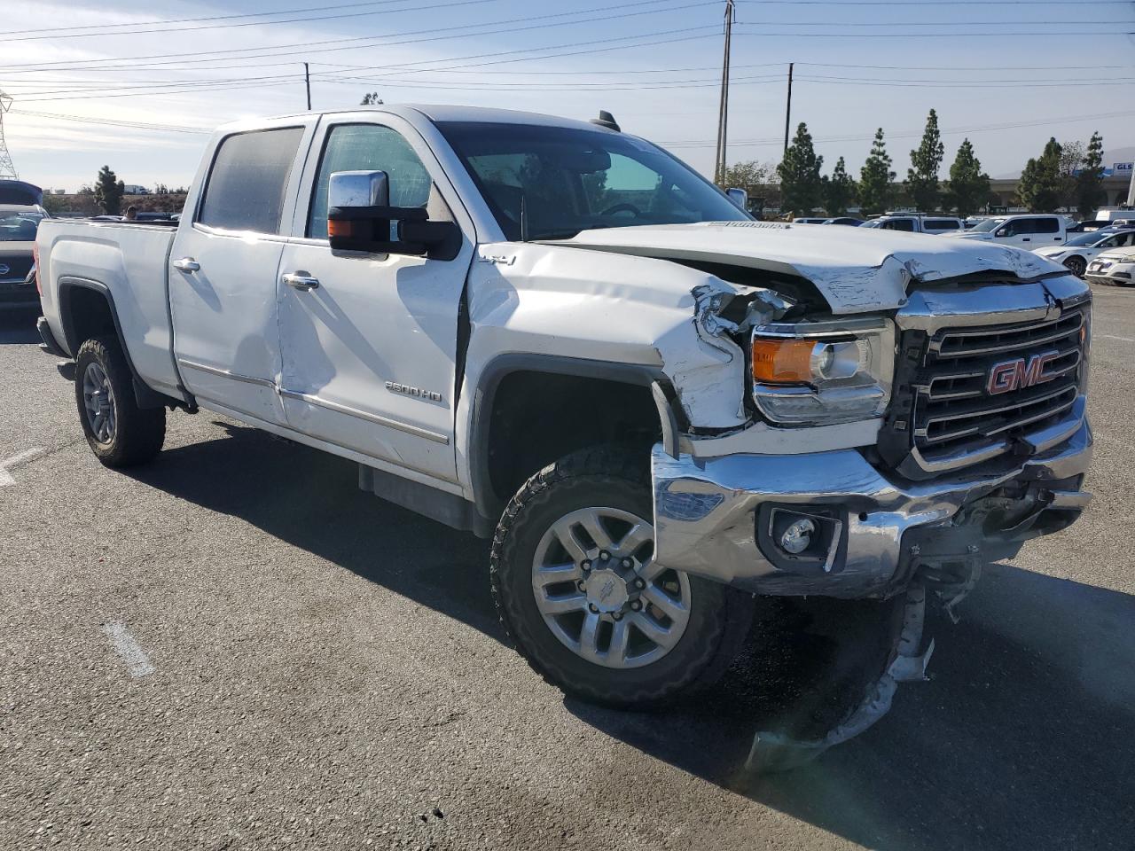 2016 GMC Sierra VIN 1GT12TE80GF247430 Copart auction photo, front end / side damage thumbnail 4