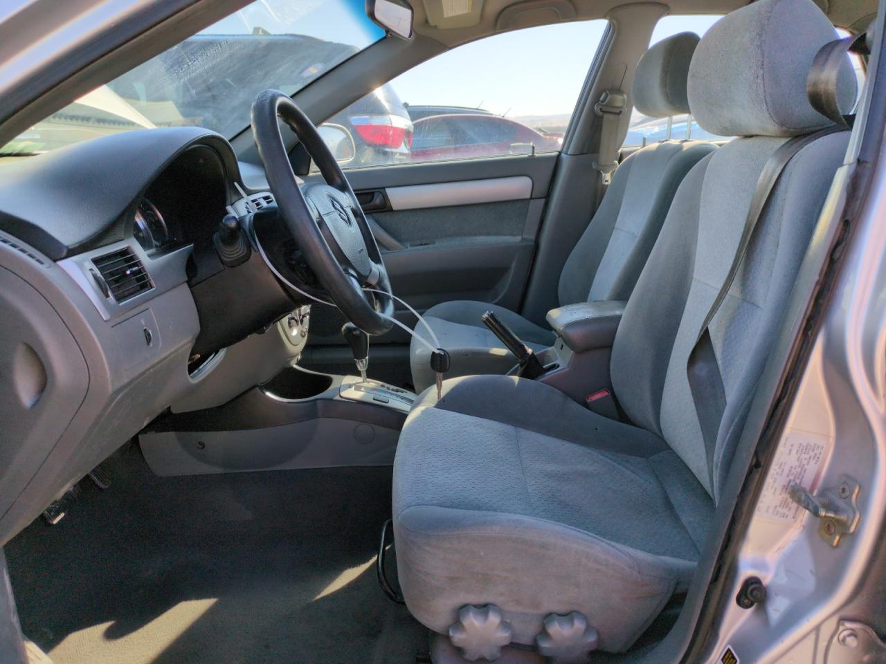 2005 Suzuki Forenza VIN KL5JD56Z45K144227 Copart auction photo, rear end damage thumbnail 7