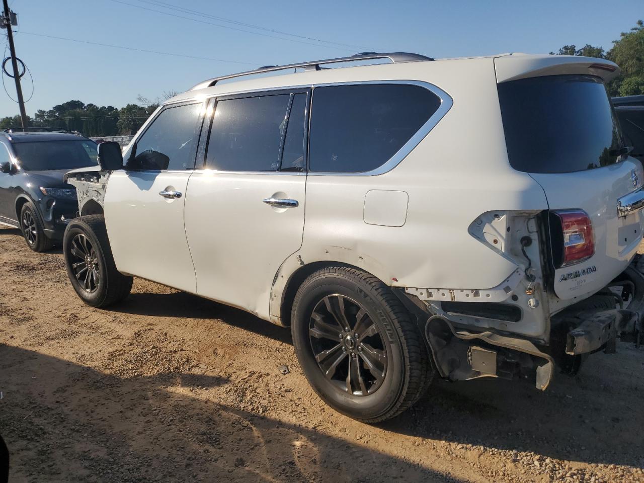 2017 Nissan Armada VIN JN8AY2NF9H9304834 Copart auction photo, front end / rear end damage thumbnail 2