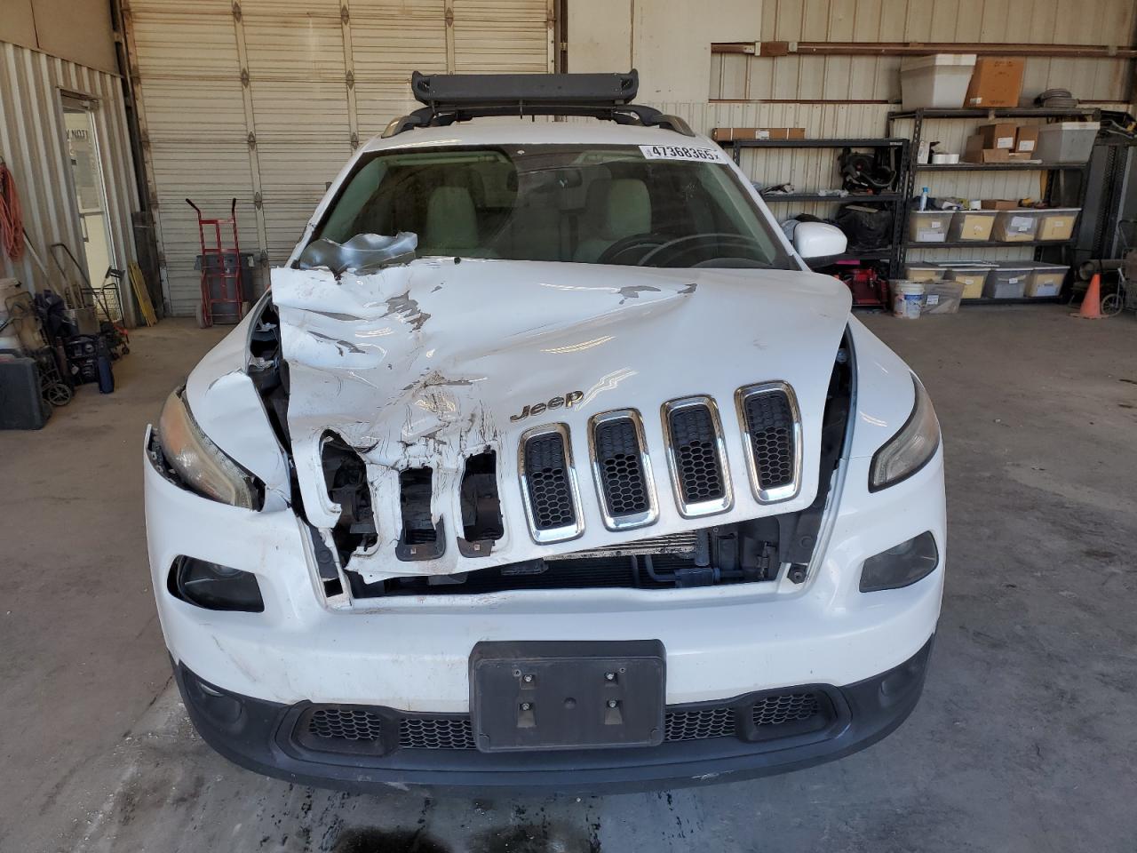 2015 Jeep Grand Cherokee VIN 1C4PJLCSXFW737707 Copart auction photo, front end / hail damage thumbnail 5