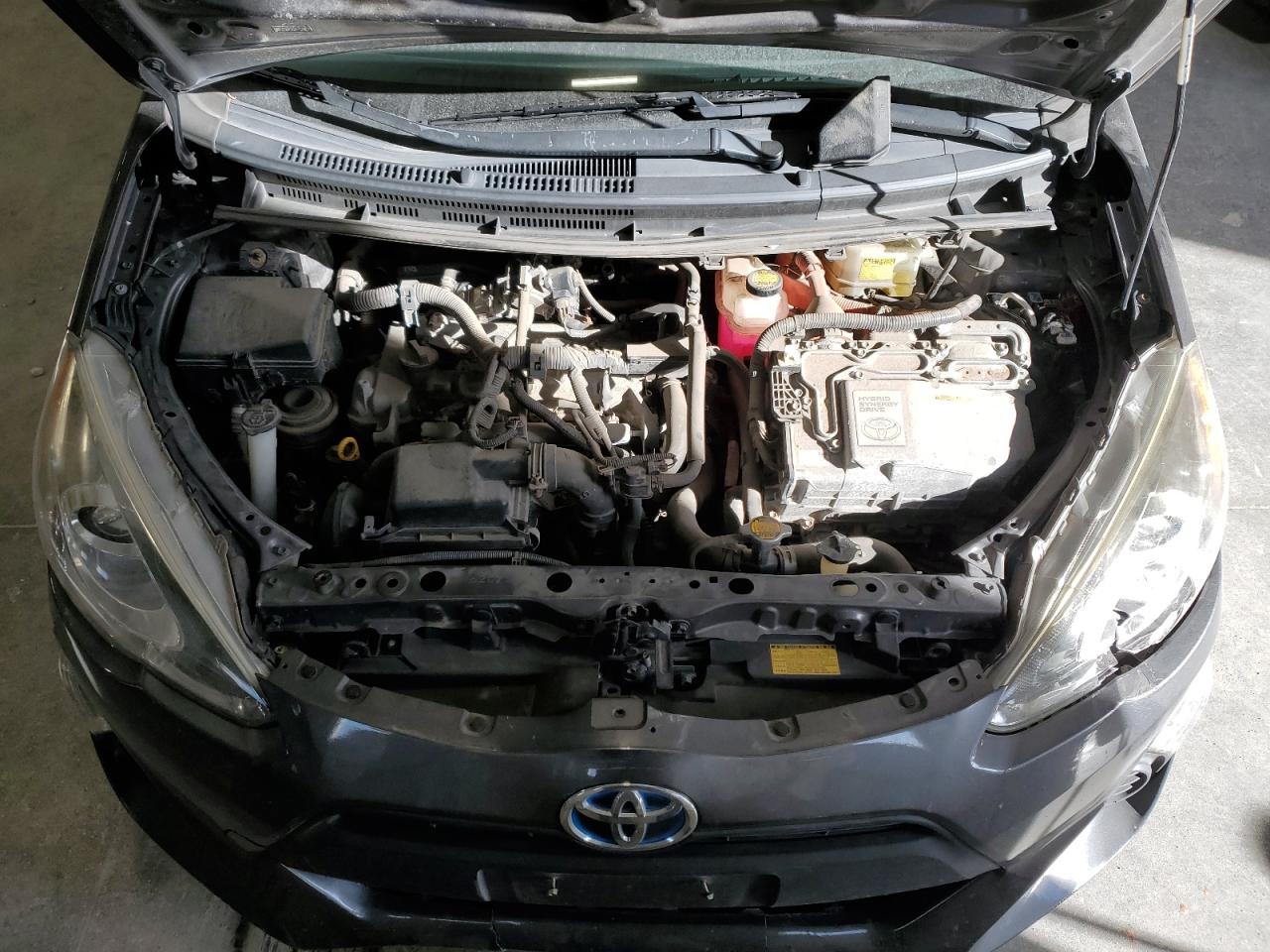 2015 Toyota Prius VIN JTDKDTB36F1584218 Copart auction photo, vandalism / hail damage thumbnail 11