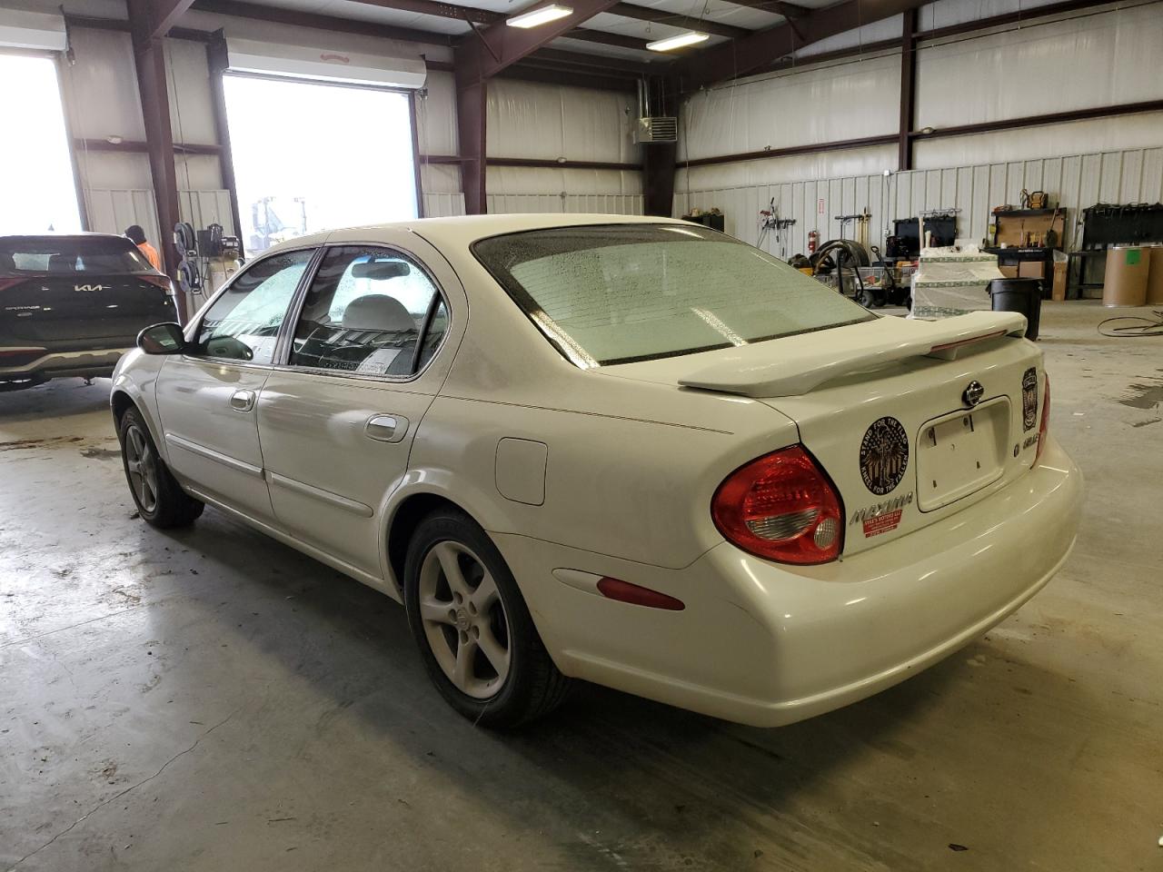 2001 Nissan Maxima VIN JN1CA31D81T823887 Copart auction photo, side damage thumbnail 2