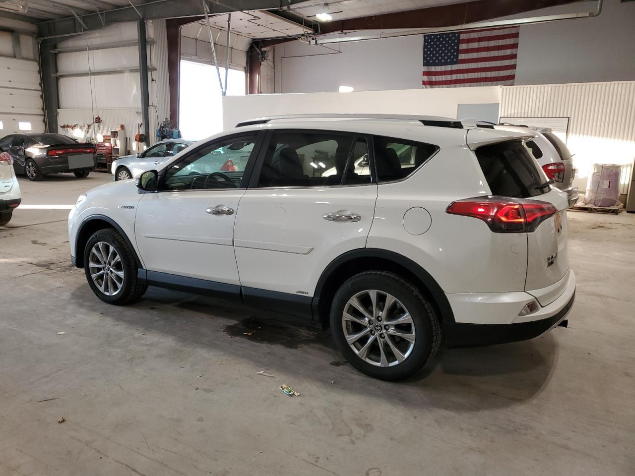 2016 Toyota RAV 4 VIN JTMDJREV1GD058967 Copart auction photo, all over damage thumbnail 2