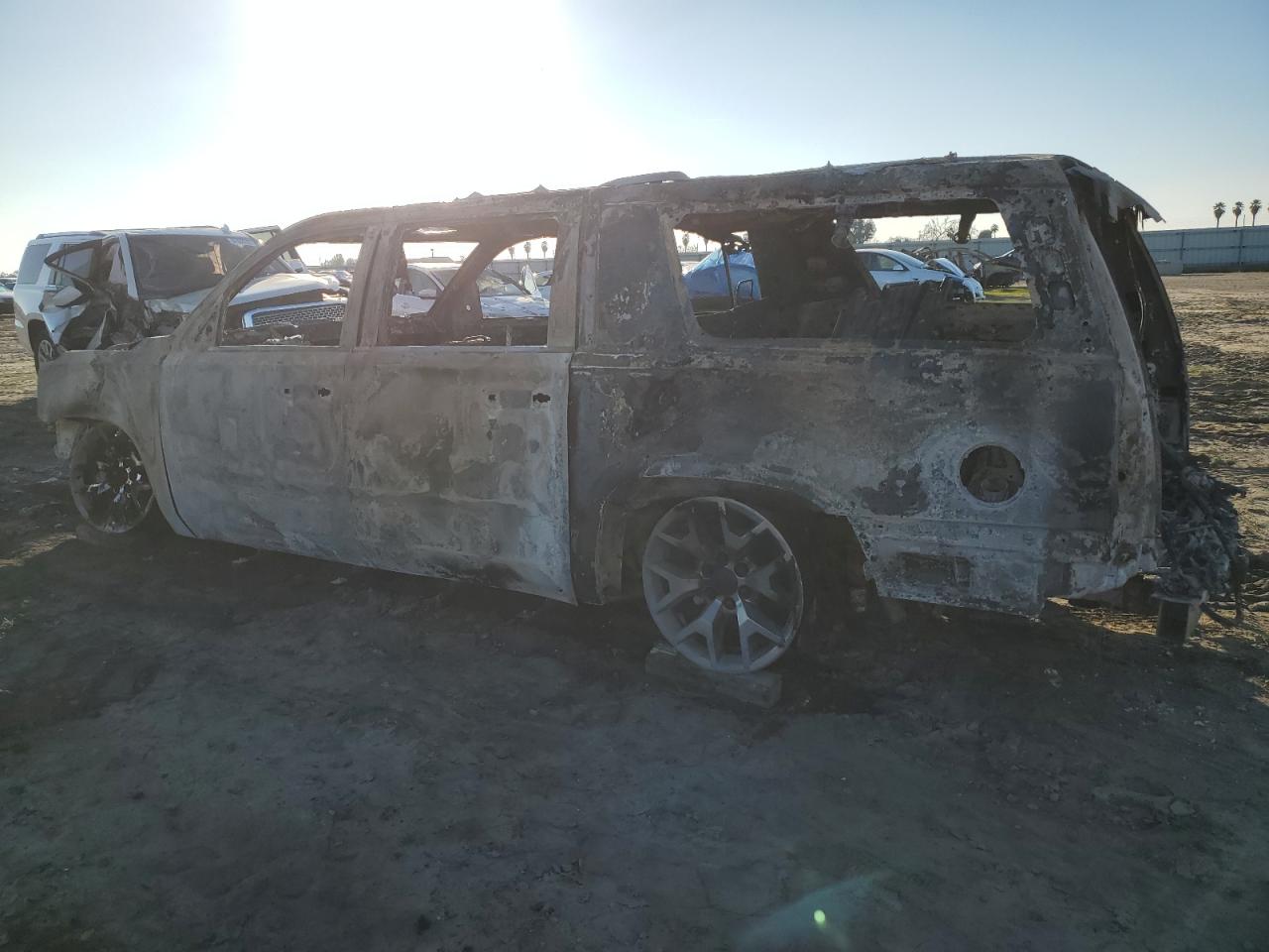 2016 GMC Yukon VIN 1GKS2GKC0GR397951 Copart auction photo, burn damage thumbnail 2