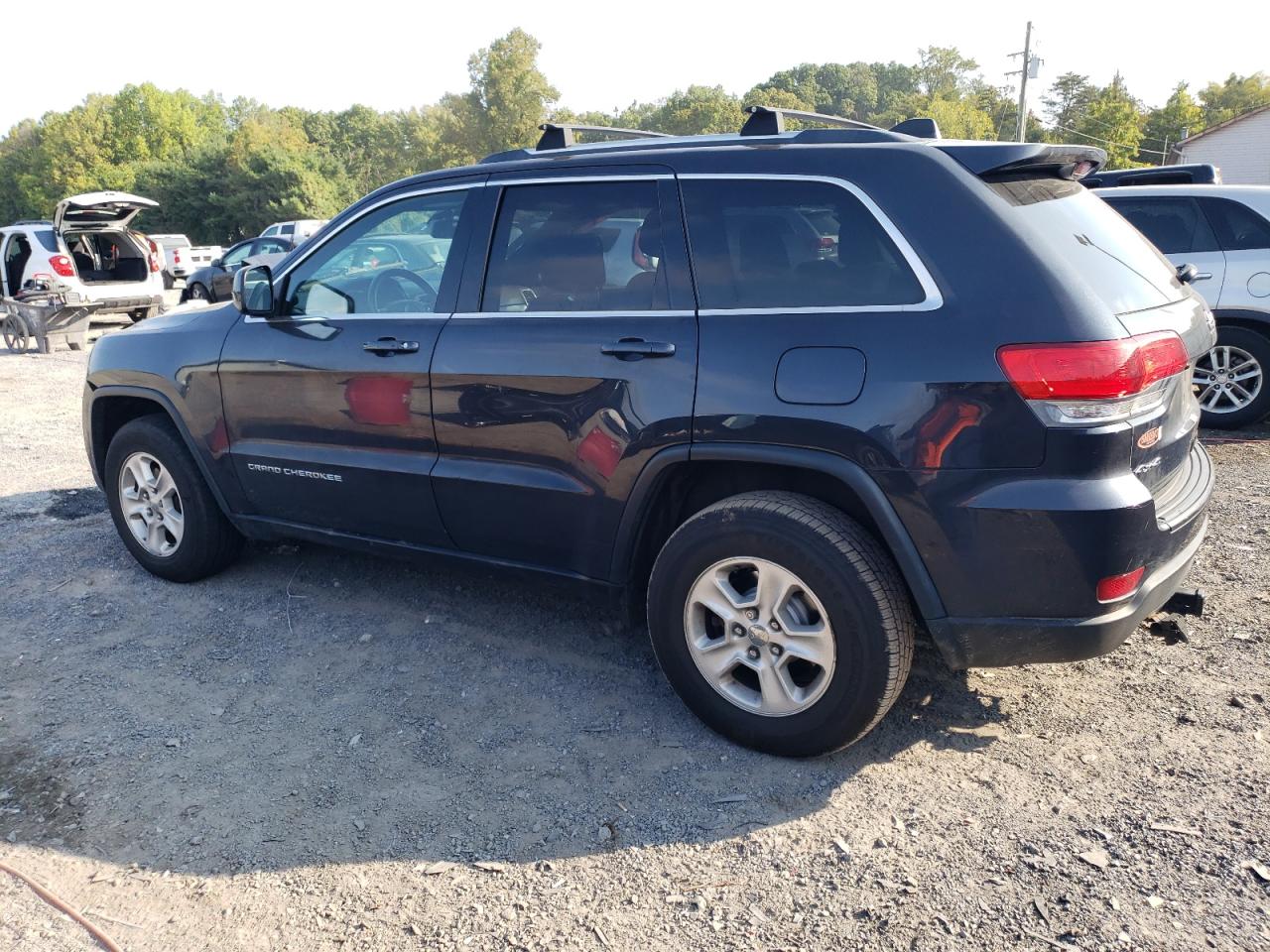 2015 Jeep Grand Cherokee VIN 1C4RJFAG9FC942851 Copart auction photo, front end damage thumbnail 2
