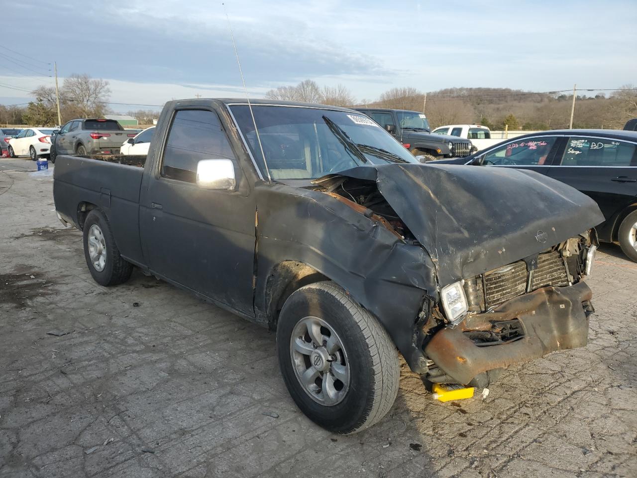 1997 Nissan Navara (Frontier) VIN 1N6SD11S2VC324783 Copart auction photo, all over damage thumbnail 4