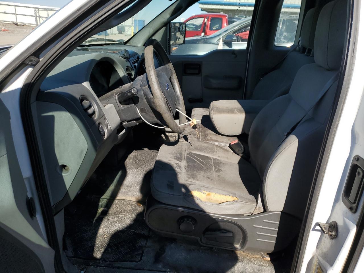 2007 Ford F-150 VIN 1FTRF12227KC38716 Copart auction photo, front end / side damage thumbnail 7