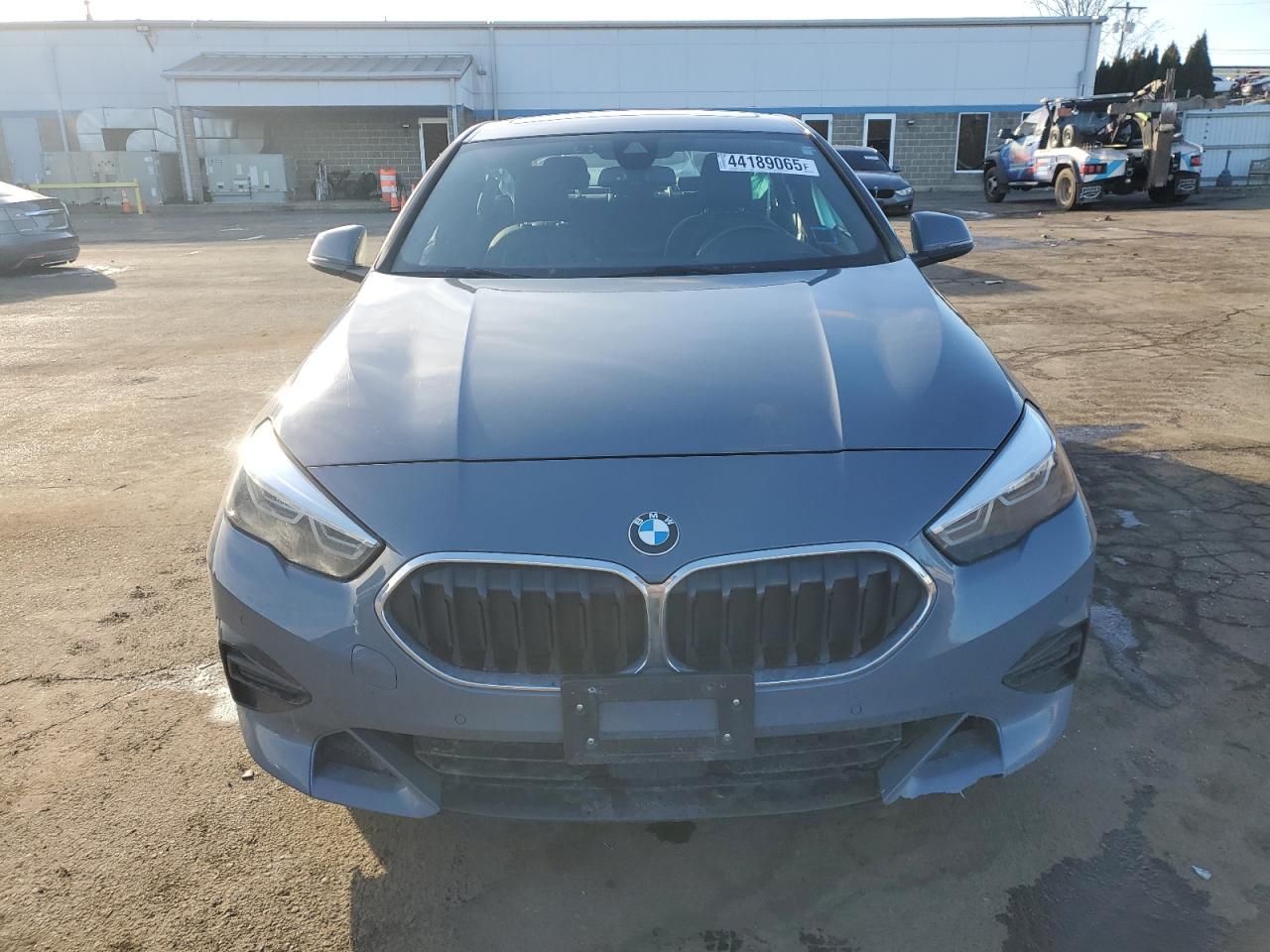 2022 BMW 2er VIN WBA73AK02N7K47993 Copart auction photo, undercarriage / minor dent/scratches damage thumbnail 5