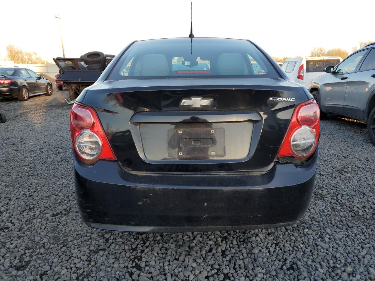 2012 Chevrolet Sonic VIN 1G1JA5SH5C4218880 Copart auction photo, rear end / front end damage thumbnail 6
