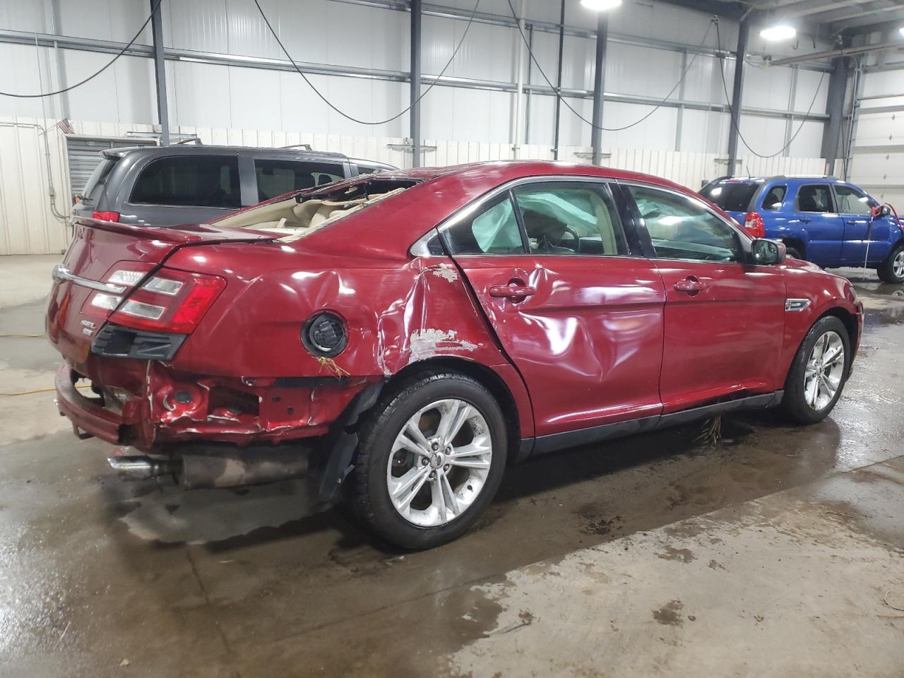 2015 Ford Taurus VIN 1FAHP2H81FG208284 Copart auction photo, rollover damage thumbnail 3