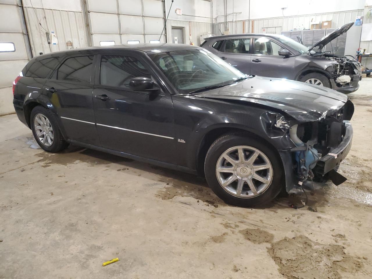 2006 Dodge Magnum VIN 2D4FV47VX6H179997 Copart auction photo, side / front end damage thumbnail 4