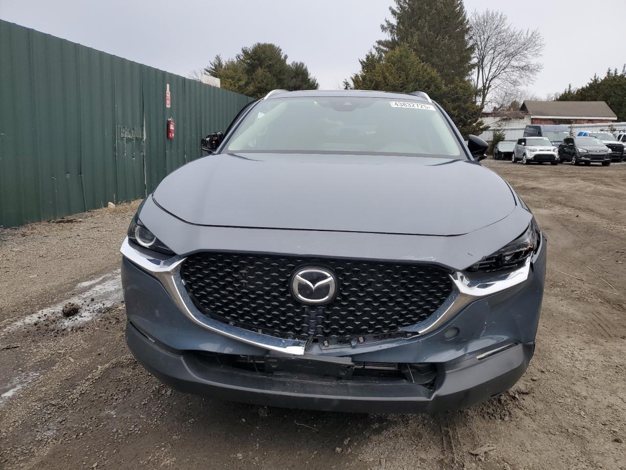 2022 Mazda CX-30 VIN 3MVDMBCL4NM457808 Copart auction photo, side / front end damage thumbnail 5