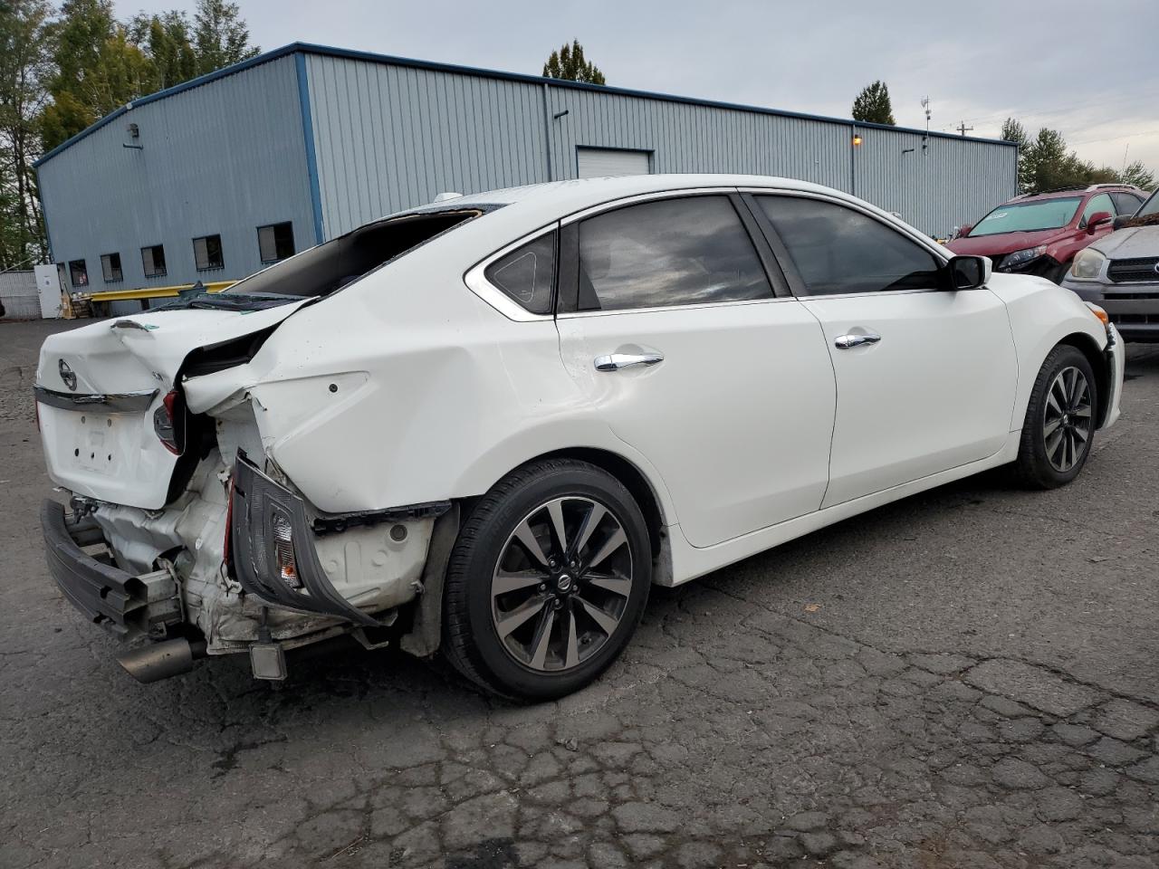 2018 Nissan Altima VIN 1N4AL3AP8JC245417 Copart auction photo, rear end / front end damage thumbnail 3