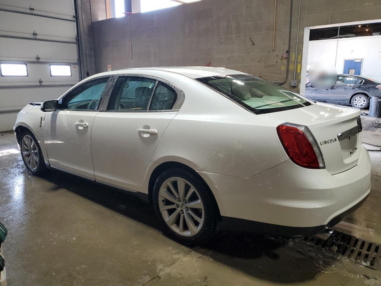 2012 Lincoln MKS VIN 1LNHL9DR2CG807649 Copart auction photo, front end / rear end damage thumbnail 2
