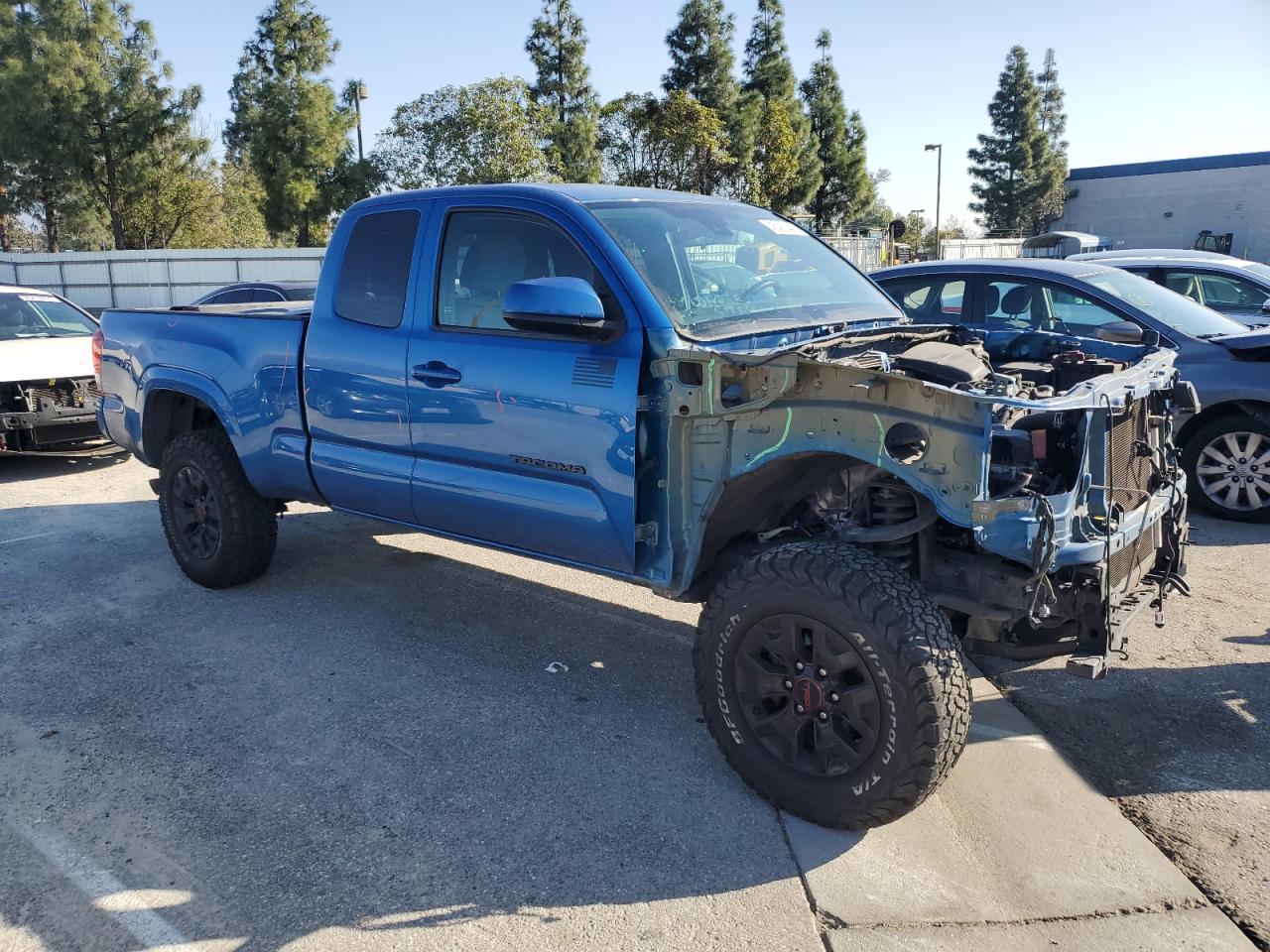 2018 Toyota Tacoma VIN 5TFRX5GN7JX124034 Copart auction photo, front end damage thumbnail 4