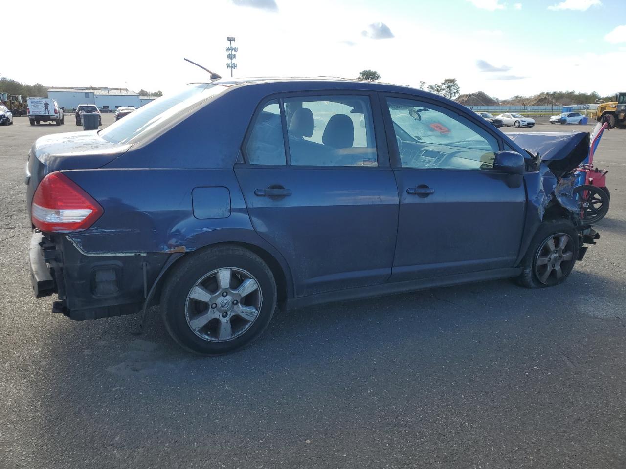 2009 Nissan Versa VIN 3N1BC11E69L441683 Copart auction photo, front end / rear end damage thumbnail 3
