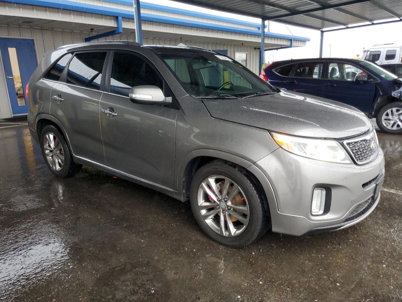 2015 KIA Sorento VIN 5XYKW4A7XFG636003 Copart auction photo, undercarriage / front end damage thumbnail 4