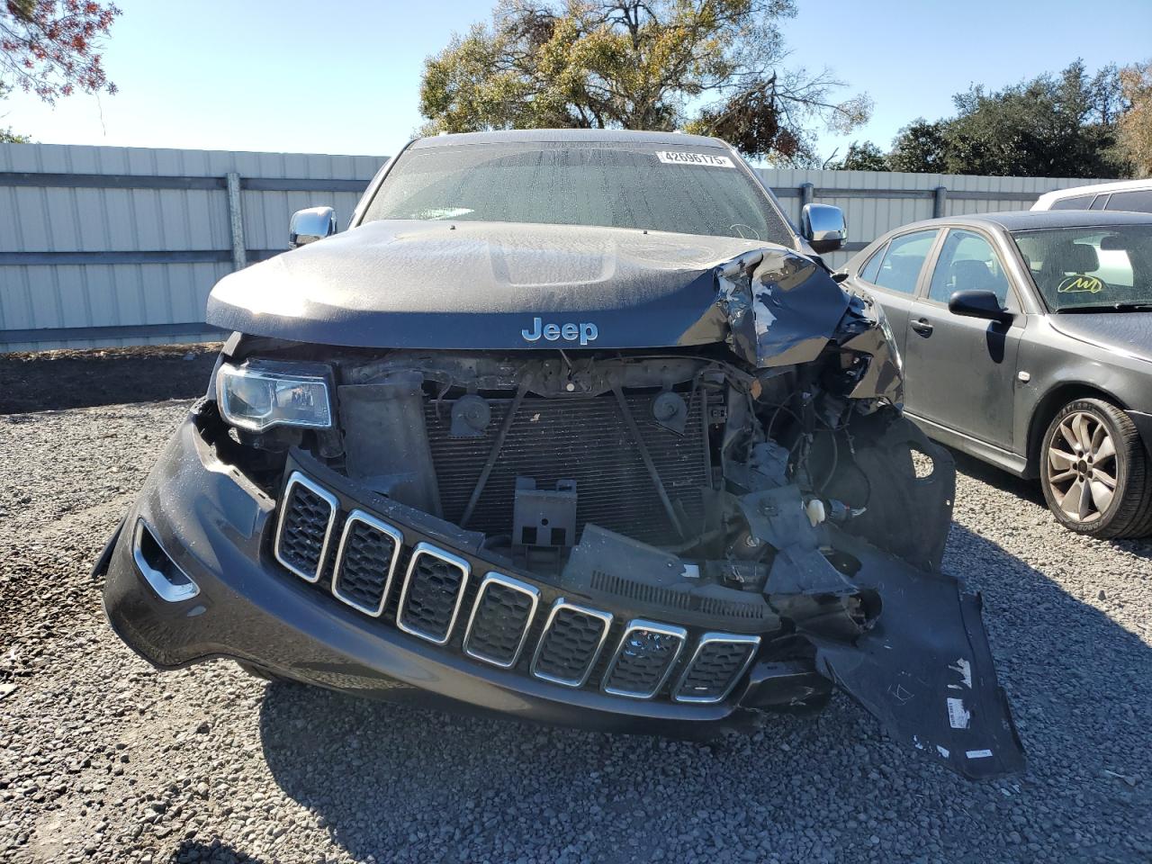 2019 Jeep Grand Cherokee VIN 1C4RJFBG0KC714620 Copart auction photo, front end / side damage thumbnail 5