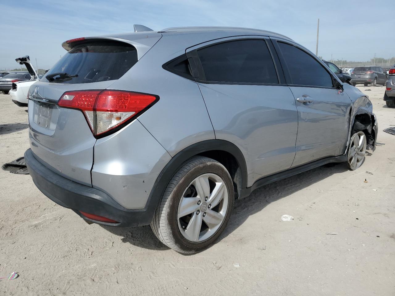 2019 Honda HR-V VIN 3CZRU5H77KM706709 Copart auction photo, front end / side damage thumbnail 3