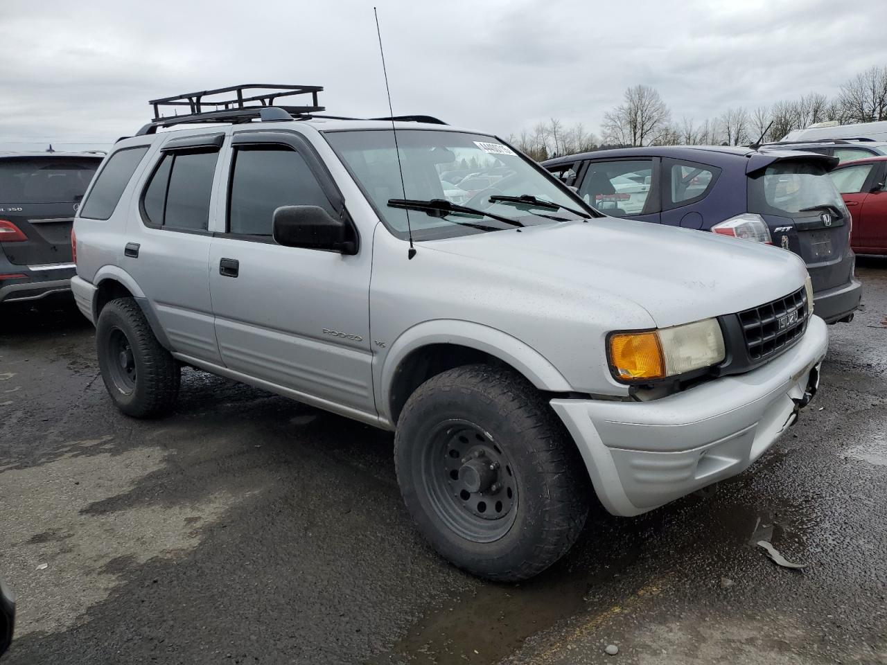 1998 Isuzu Rodeo VIN 4S2CK58W1W4327395 Copart auction photo, rear end damage thumbnail 4