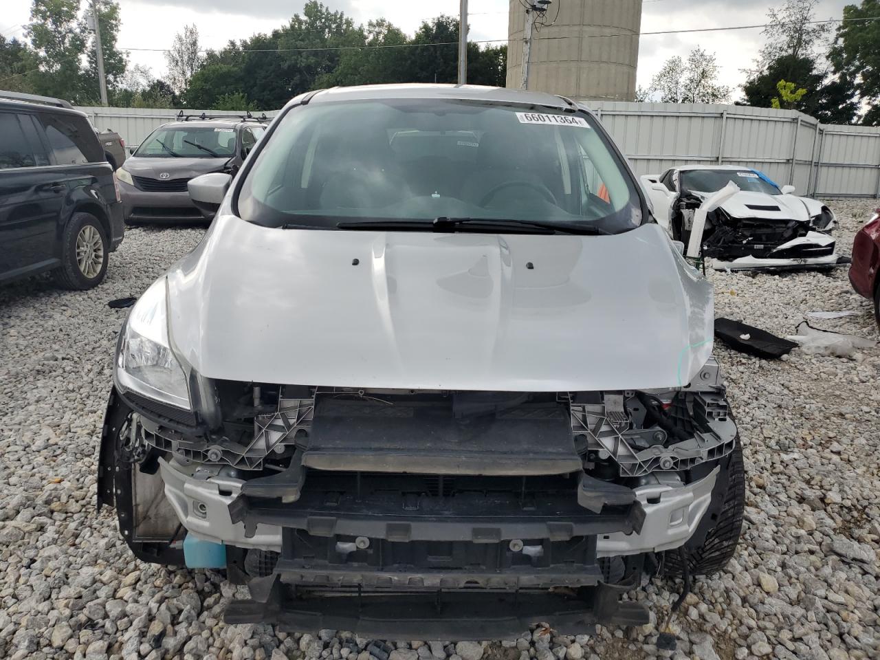 2015 Ford Escape VIN 1FMCU9G92FUB28974 Copart auction photo, all over damage thumbnail 5