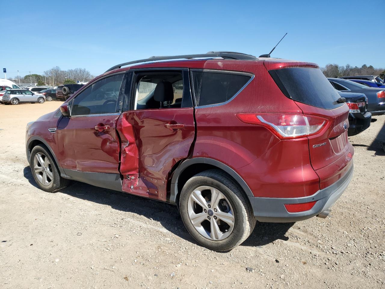 2015 Ford Escape VIN 1FMCU0GX0FUC73537 Copart auction photo, side damage thumbnail 2