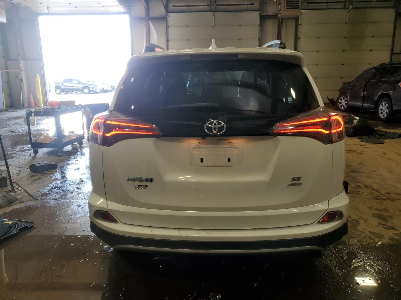 2018 Toyota RAV 4 VIN JTMJFREV8JD242461 Copart auction photo, side / rear end damage thumbnail 6