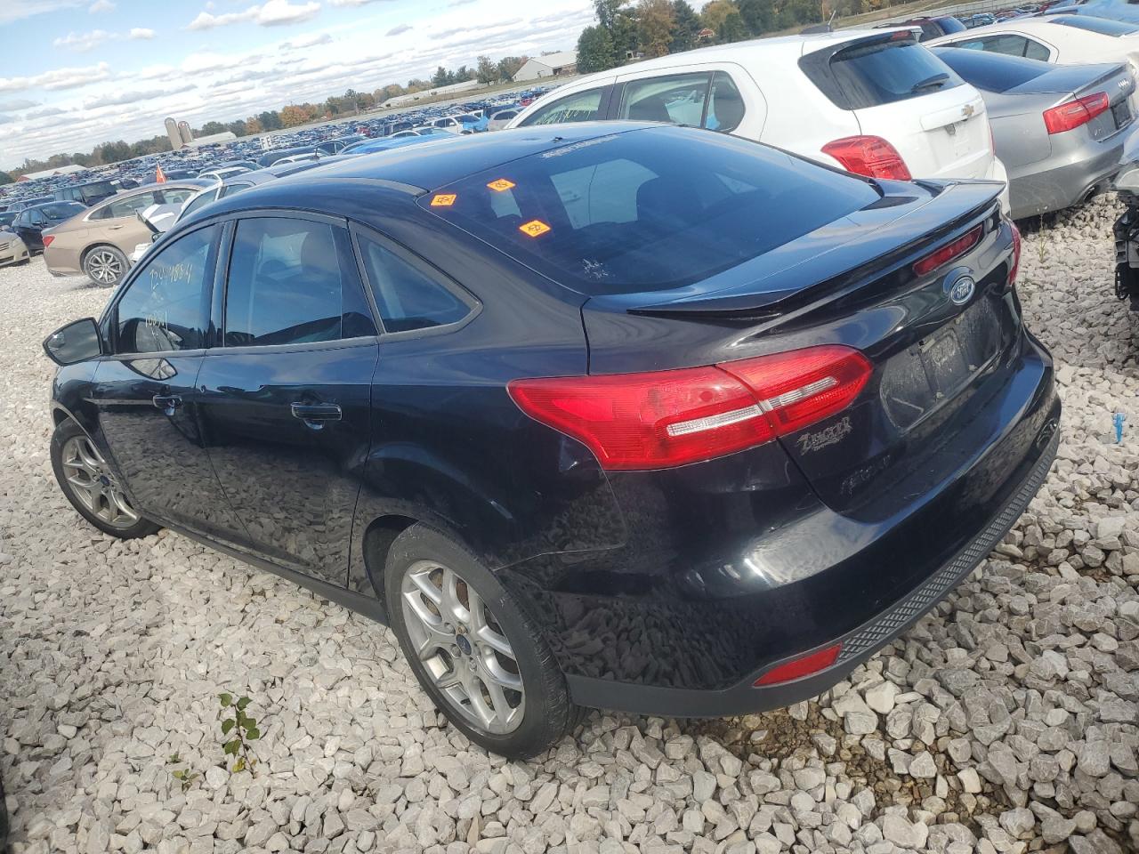2015 Ford Focus VIN 1FADP3F28FL286944 Copart auction photo, vandalism damage thumbnail 2