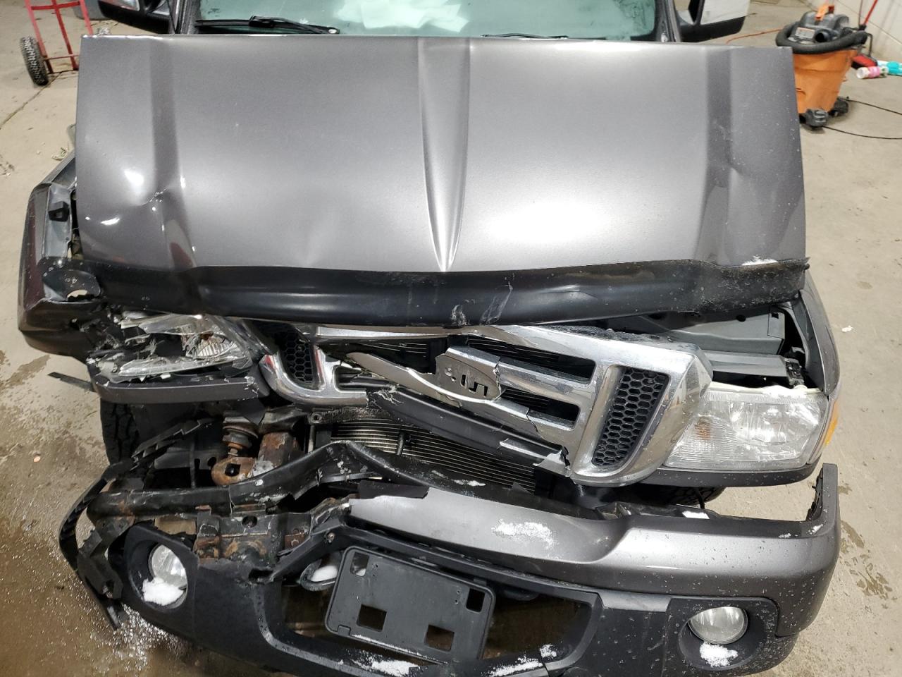 2011 Ford Ranger VIN 1FTLR4FE7BPA94983 Copart auction photo, front end / side damage thumbnail 12
